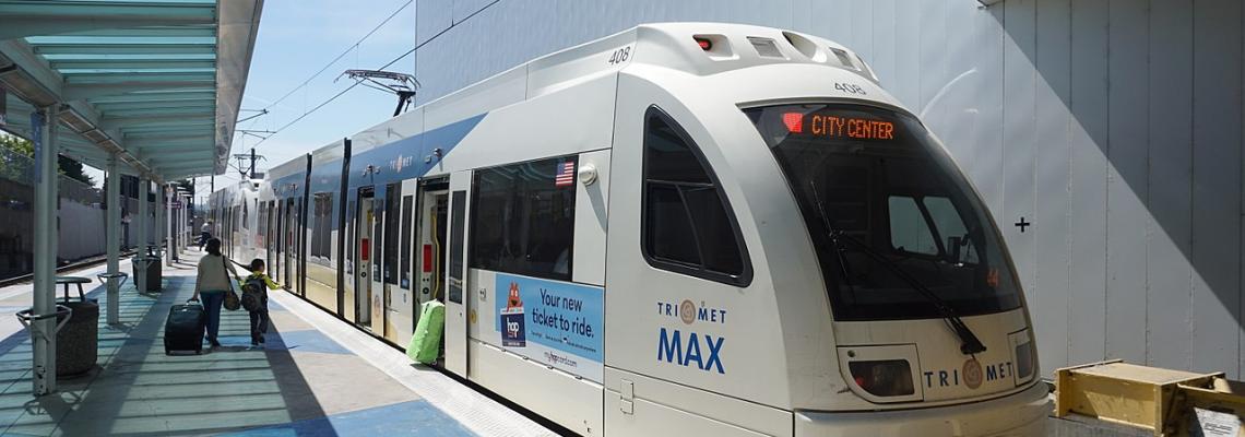A MAX Red Line train prepares to depart from Portland International Airport